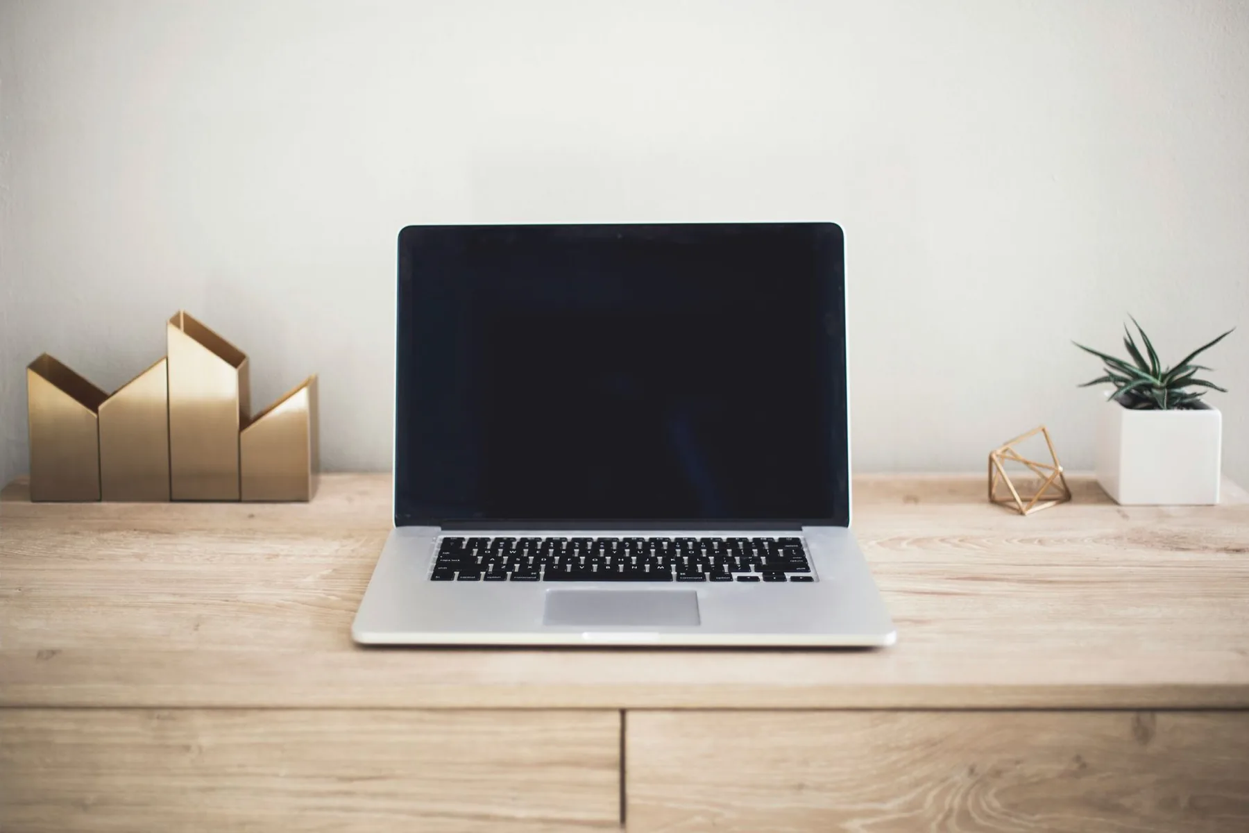 Laptop set up for a secure online therapy session in North Carolina