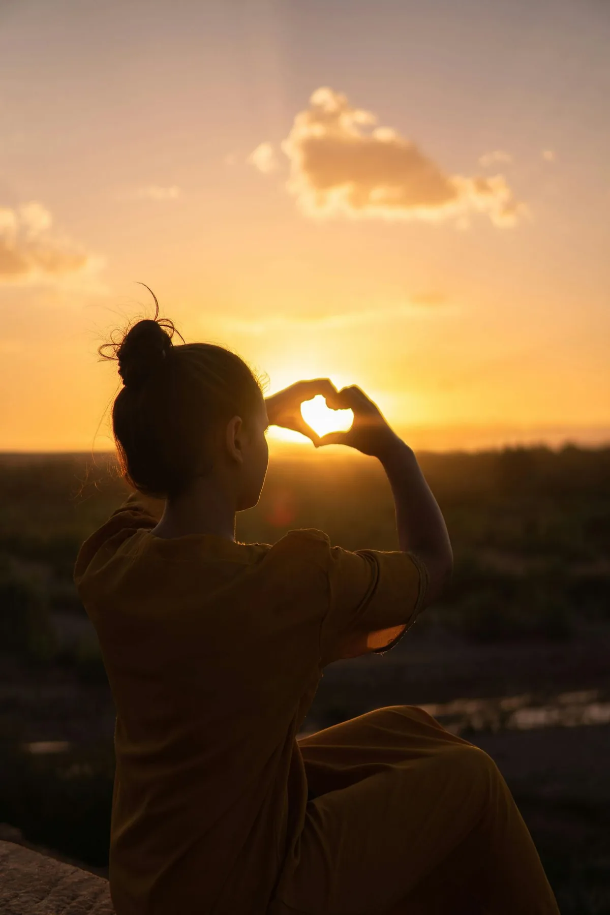 Person watching the sunrise, representing individual therapy in Charlotte, NC